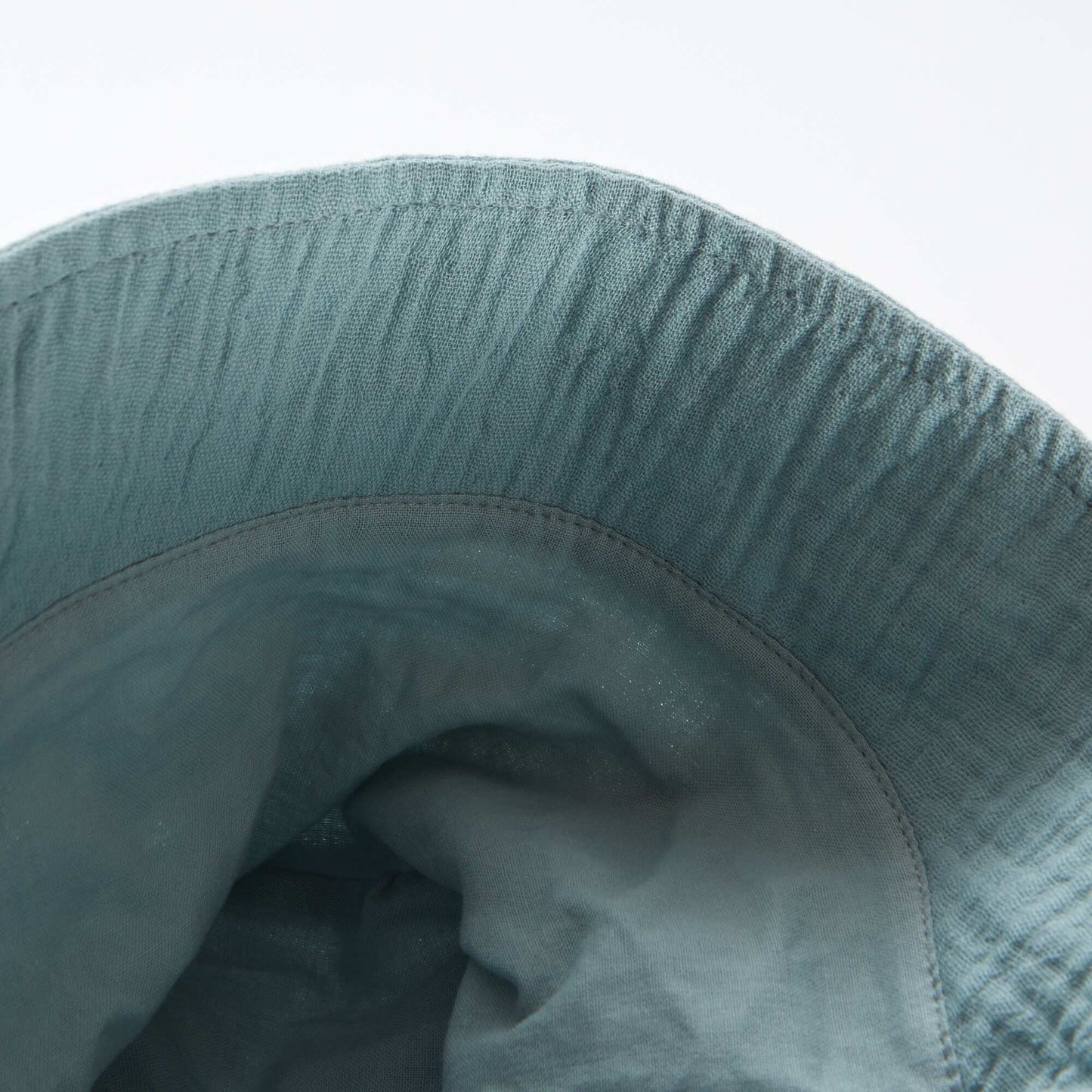 Cotton gauze bucket hat with embroidered sun BLUE