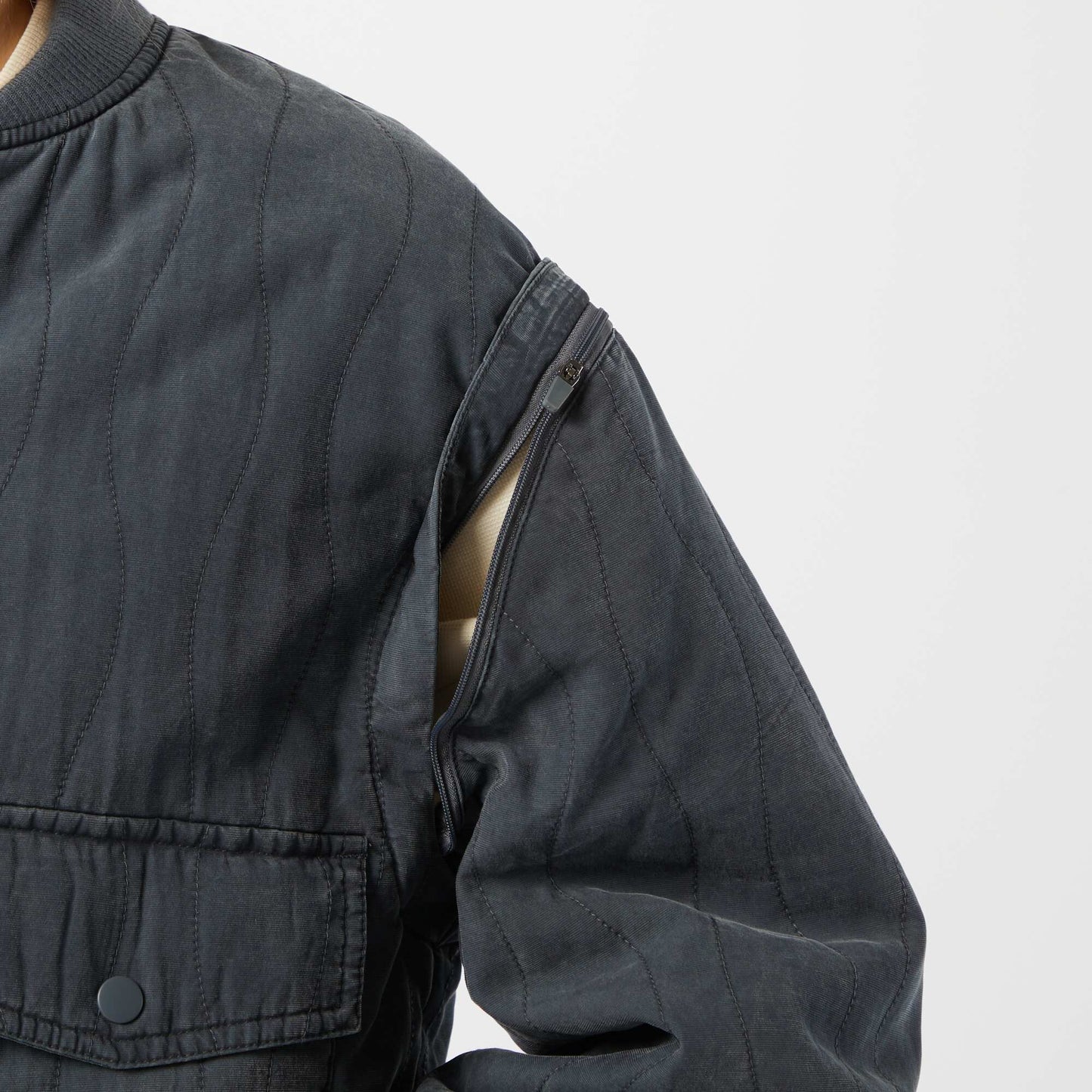 2-in-1 quilted jacket with detachable sleeves BLACK