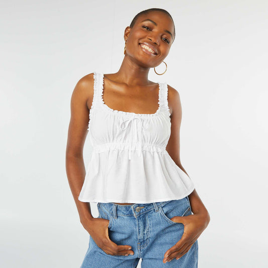 Sleeveless top with ruffled hems WHITE