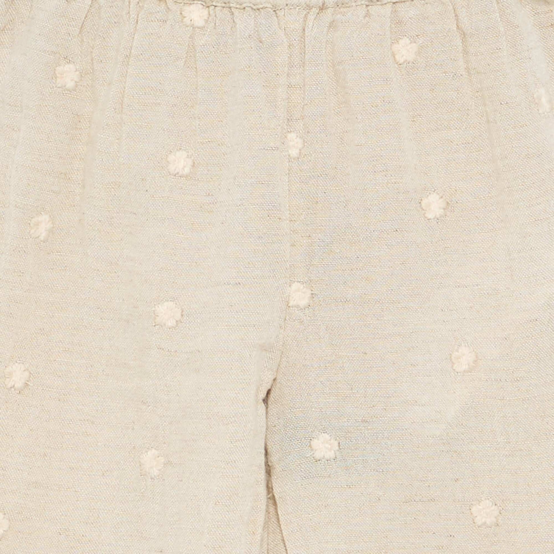 შარვალი ყვავილებიანი ნაქარგებით კრემისფერი