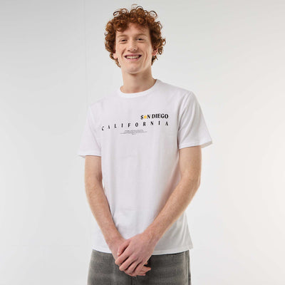 პრინტიანი ბამბის ჯვარედინი ყელიანი მაისური თეთრი