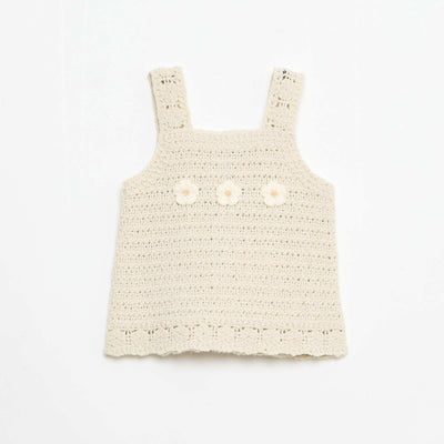 უმკლავო ნაქსოვი სვიტერი „ყვავილის“ დეტალებით კრემისფერი