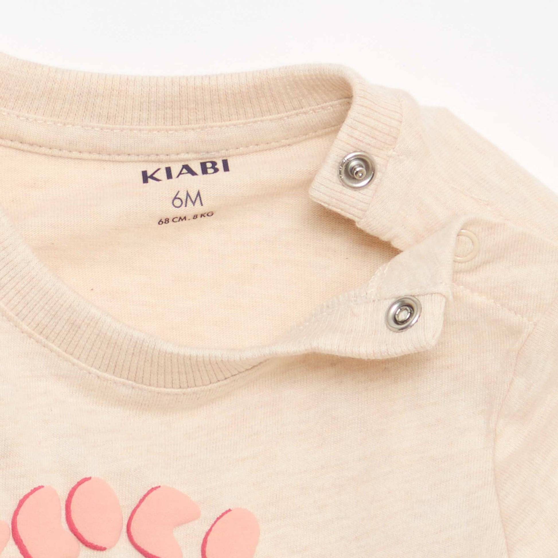 მაისური ანიმაციით პრინტიანი კრემისფერი