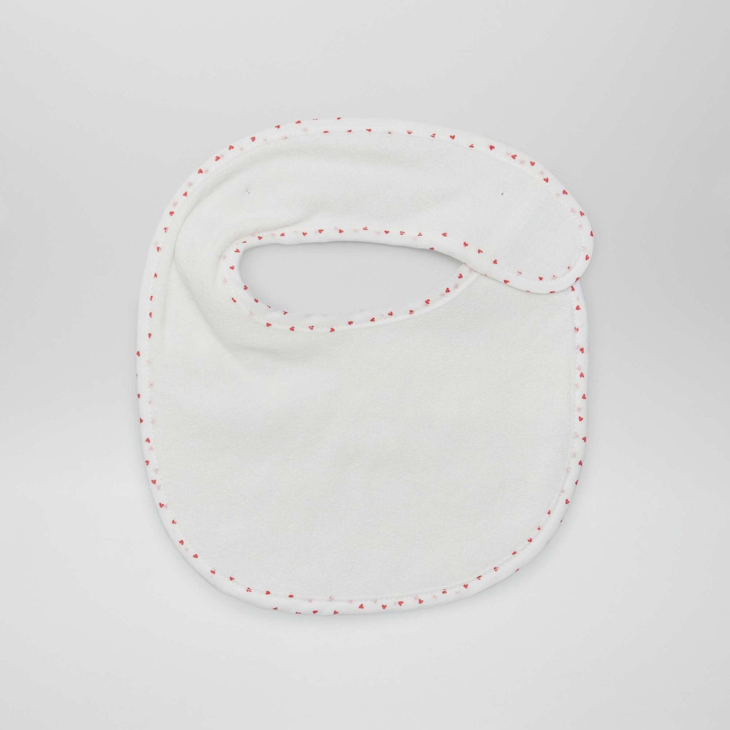 Pack of 7 towelling bibs with hook and loop fastening WHITE